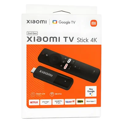 Caixa branca e laranja do Xiaomi TV Stick 4K de 2ª geração, com Google TV