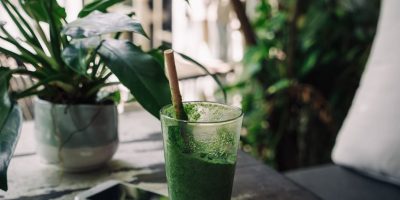green drink on a wooden table